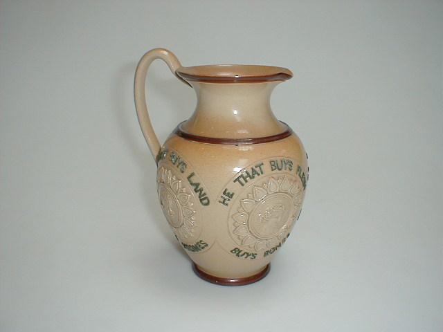 Appraisal: A Doulton Lambeth stoneware ovoid jug with an everted rim