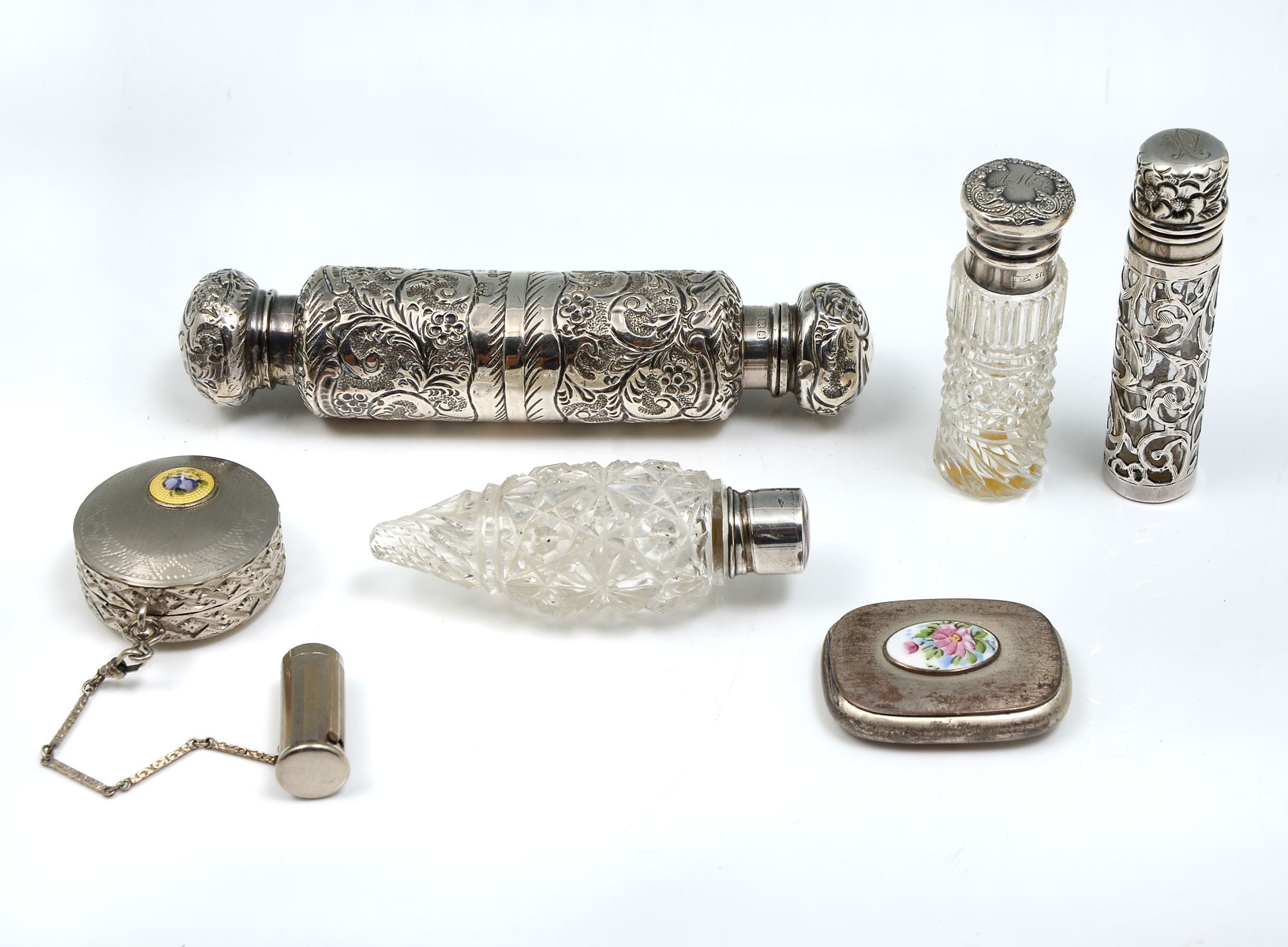 Appraisal: PIECE SILVER REPOUSSE GLASS PERFUME BOTTLES AND COMPACTS Cut glass