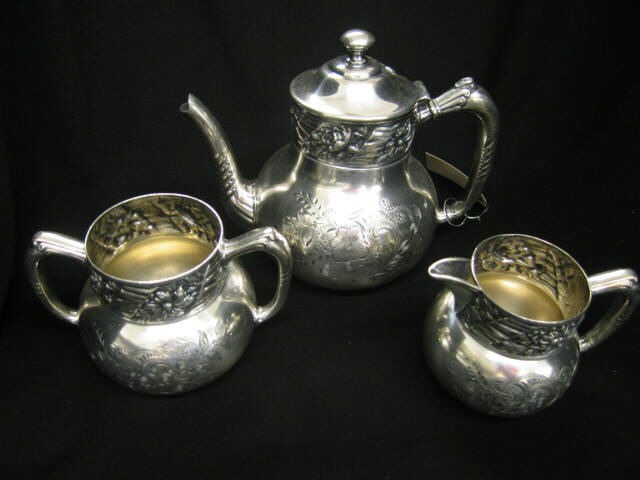 Appraisal: Fine Victorian Silverplate Tea Set pot creamer sugar ornate floral