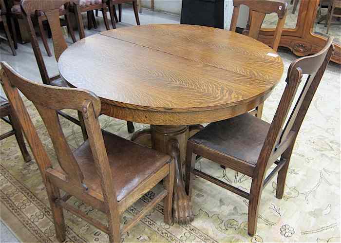 Appraisal: ROUND OAK DINING TABLE AND SIX CHAIRS American c the