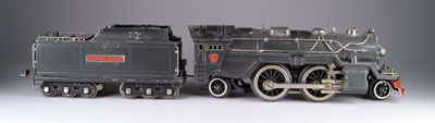 Appraisal: LIONEL E LOCOMOTIVE AND TENDER CONDITION Minor chips to the