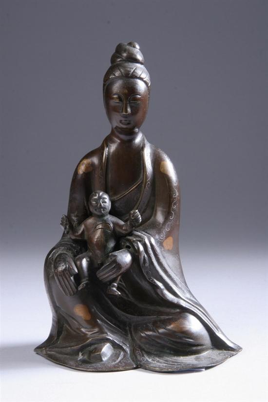 Appraisal: CHINESE BRONZE FIGURE OF GUANYIN AND CHILD Wearing long robes