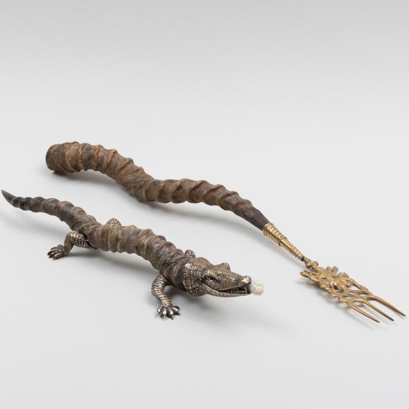 Appraisal: Two Metal-Mounted Horn Table Articles Comprising A crocodile cigar lighterA