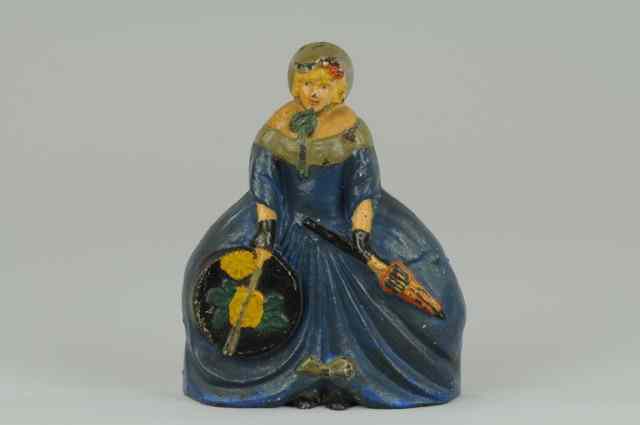 Appraisal: WOMAN IN HOOPSKIRT WITH PARASOL HATBOX DOORSTOP ''Albany Co ''