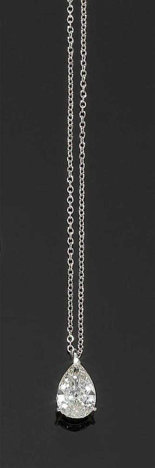 Appraisal: DIAMOND PENDANT WITH CHAIN White gold Fine pendant set with