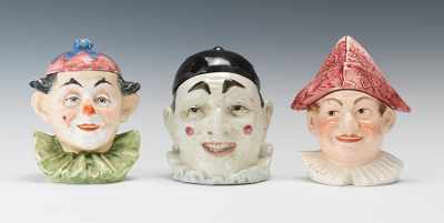 Appraisal: Joyful Clowns Three Clown Head Tobacco Jars Three smiling clown