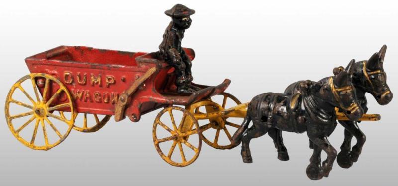 Appraisal: Cast Iron Mule-Drawn Dump Wagon Toy Description Pulled by two