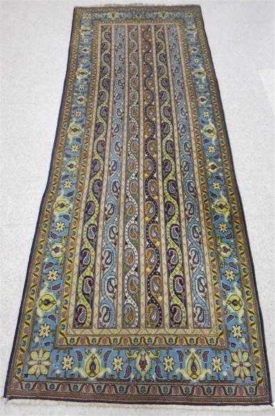 Appraisal: PERSIAN AREA RUG hand knotted with repeating columns of boteh