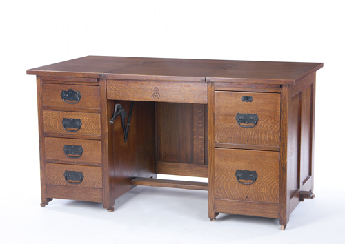 Appraisal: ROYCROFT Office desk with a typewriter-concealing flip-top lid two banks