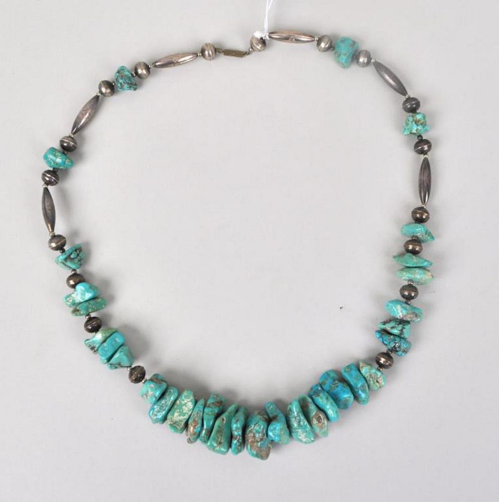 Appraisal: Vintage Navajo Turquoise Silver Necklace composed of turquoise nuggets and