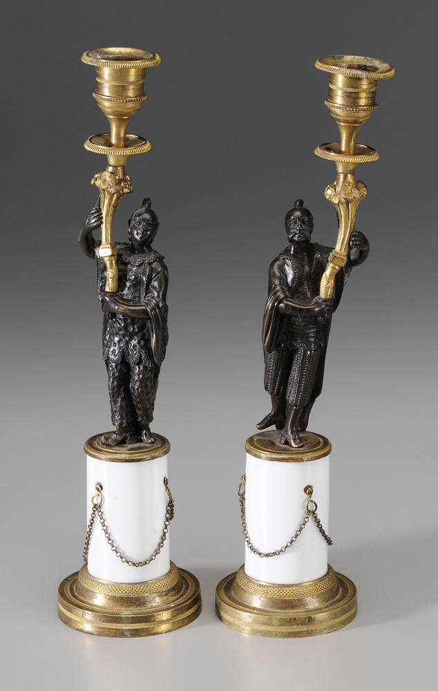 Appraisal: Pair Gilt Bronze Candlesticks French th century male and female