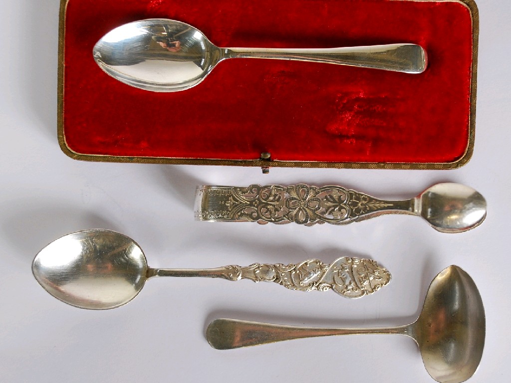 Appraisal: VICTORIAN SILVER SUGAR BOW pierced and bright cut engraved in