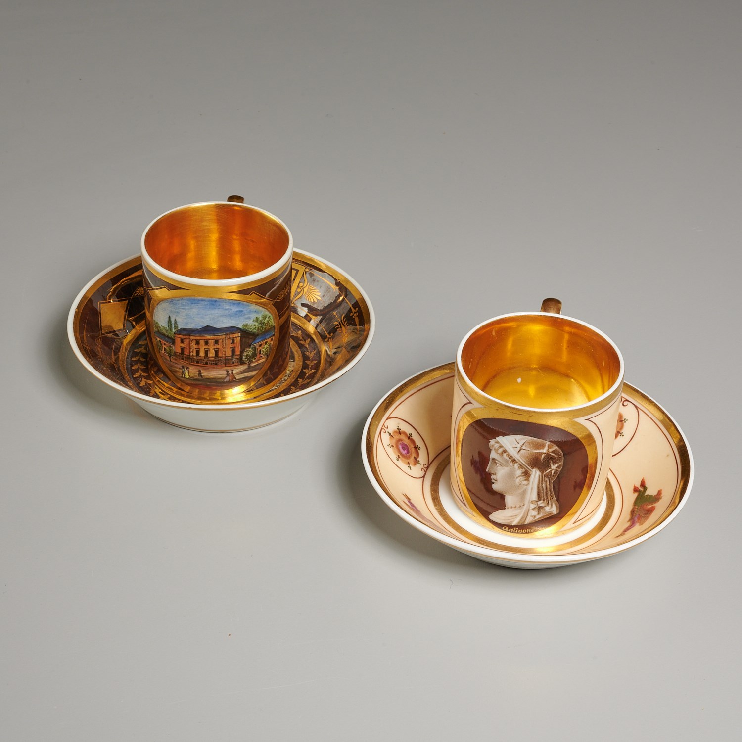 Appraisal: PAIR LOCRE RUSSINGER TEACUPS AND SAUCERS th th c French