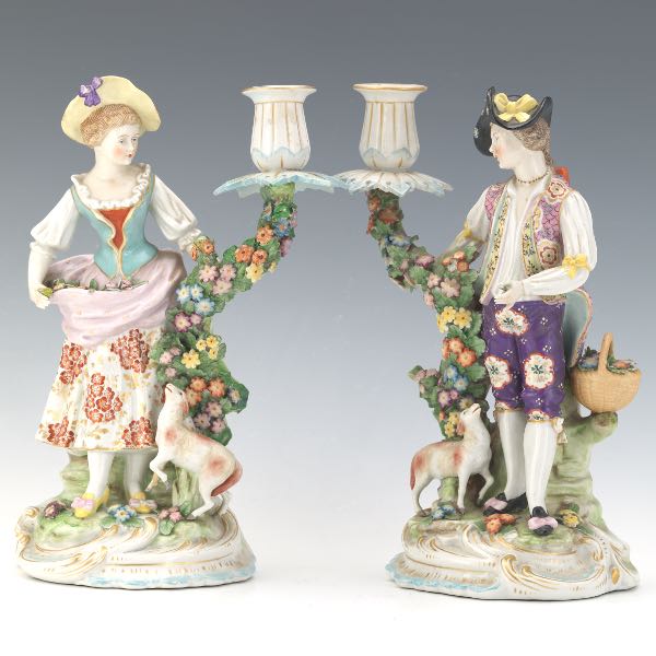 Appraisal: PAIR OF ANTIQUE CHELSEA PORCELAIN FIGURINES OF SHEPHERD AND SHEPHERDESS