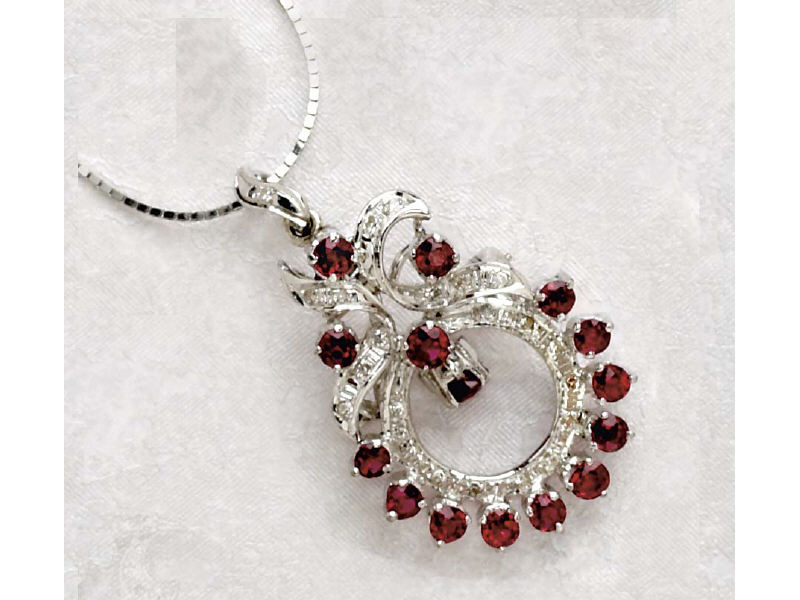 Appraisal: RUBY AND DIAMOND PENDANT BROOCH White gold brooch with pendant