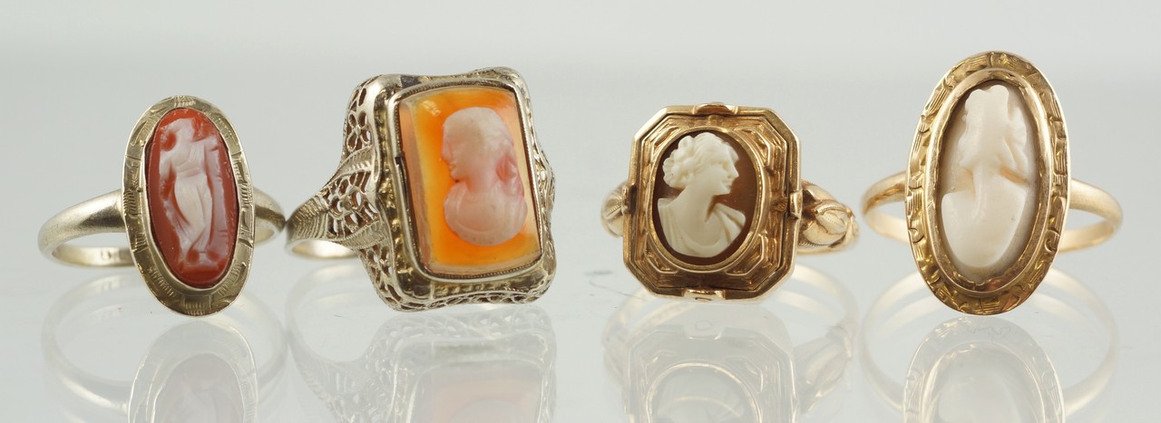 Appraisal: carved shell cameo rings unmarked WG filigree stamped K YG