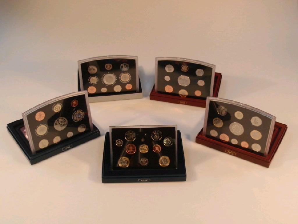 Appraisal: Five United Kingdom coin proof sets boxed and with original