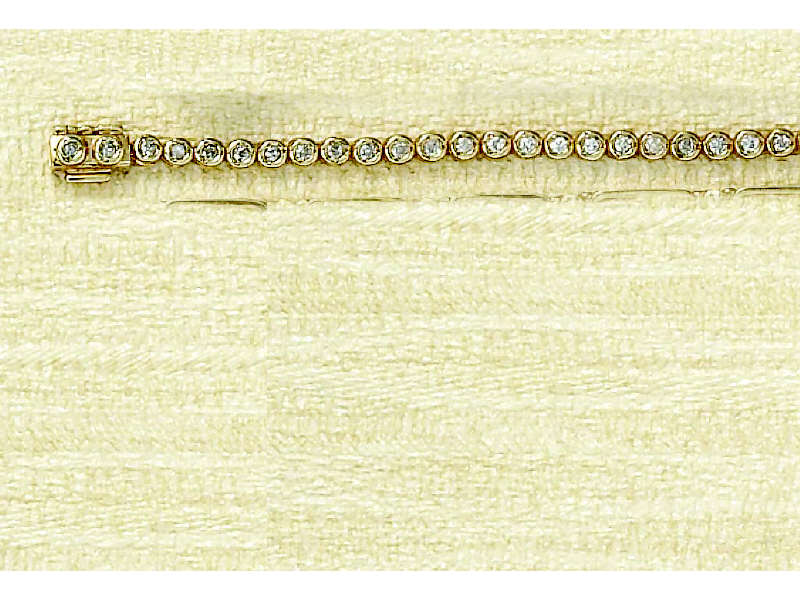 Appraisal: DIAMOND BRACELET k yellow gold bracelet with fifty-three bezel set