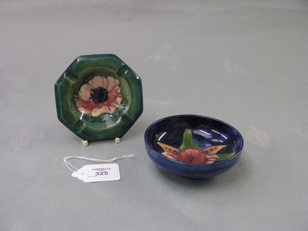 Appraisal: A Moorcroft ashtray Anemone octagonal shape against a green ground