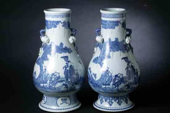 Appraisal: PAIR CHINESE BLUE AND WHITE PORCELAIN VASES Kangxi mark Figural