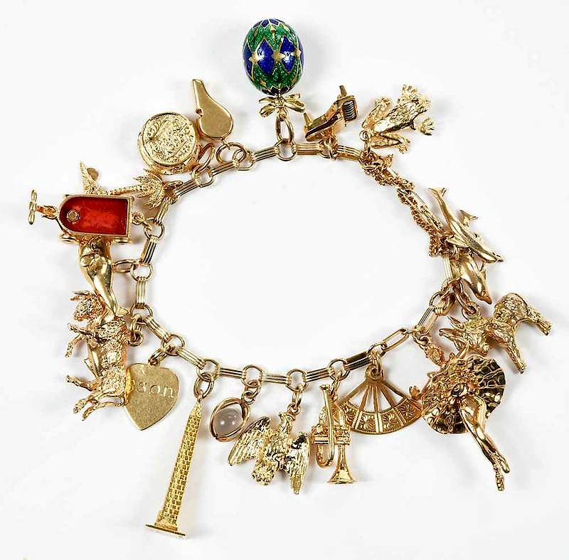 Appraisal: kt Gold Charm Bracelet charms including bull piano wagon some