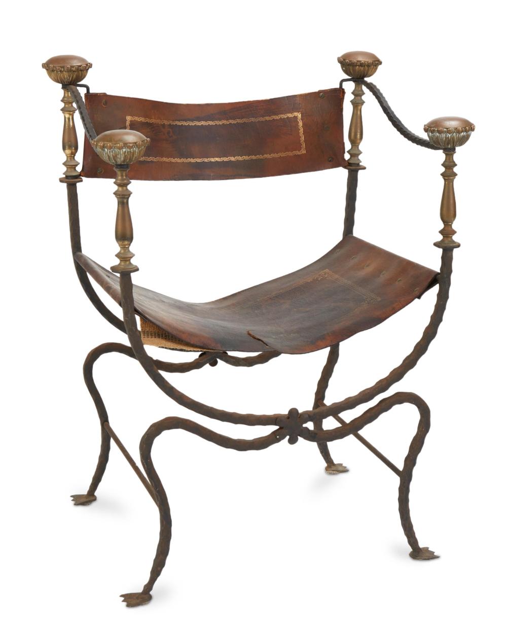 Appraisal: A wrought iron and brass Savonarola armchair First-half th Century