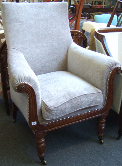 Appraisal: A William IV mahogany framed easy chair the rectangular back