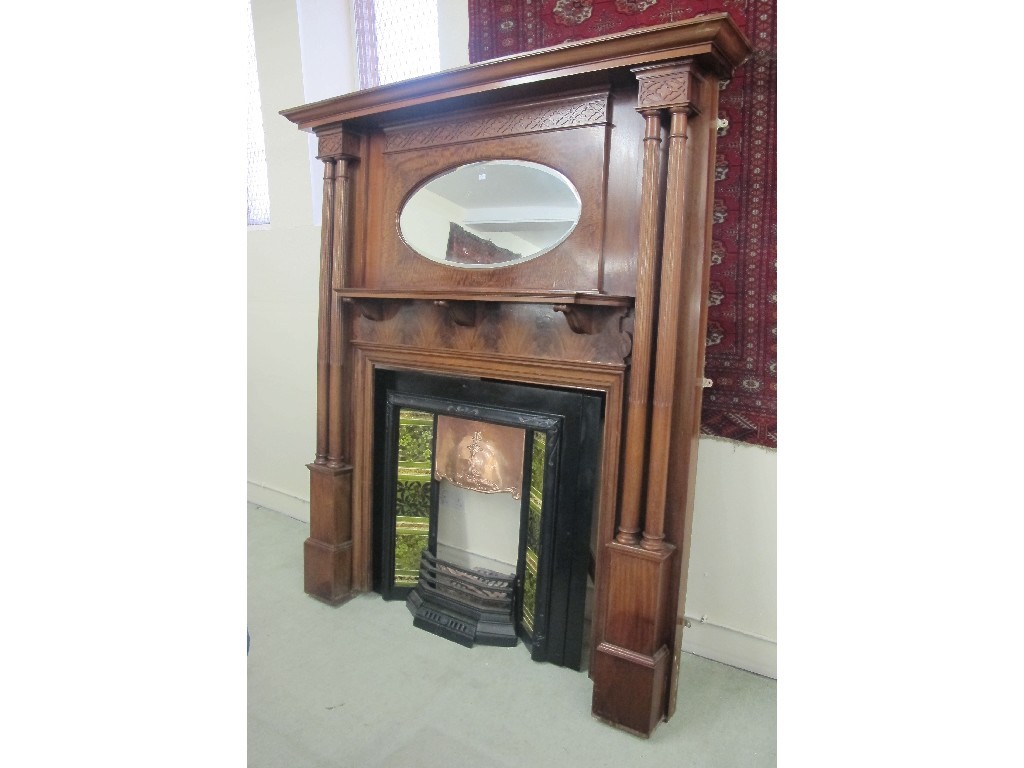 Appraisal: A good Edwardian mahogany mirrored back fire surround with an