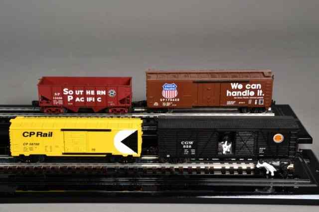 Appraisal: LIONEL - MISCELLANOUS BOXCARSIncluding four different boxcars yellow CP Rail