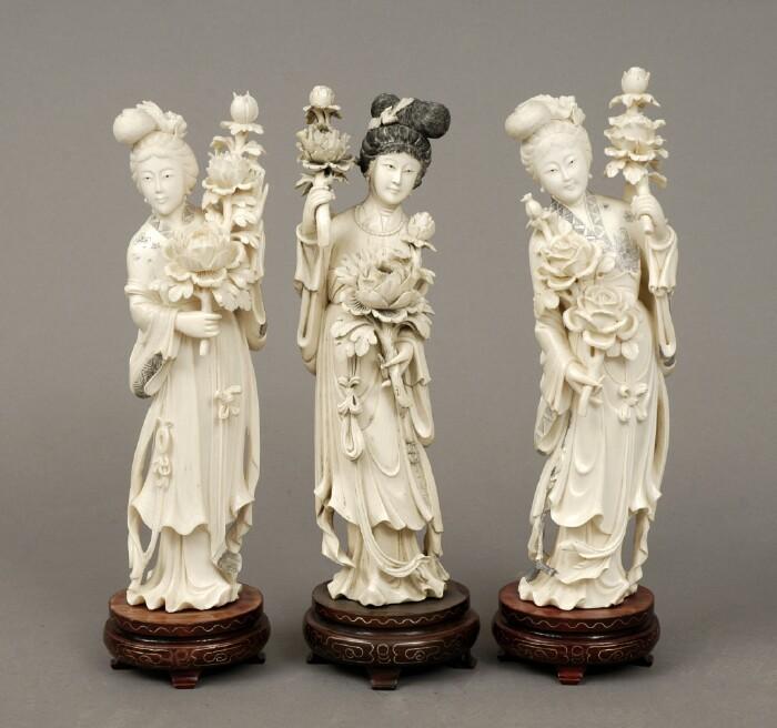 Appraisal: Three Chinese Carved Ivory Figures of Women Holding Lotus Flowers