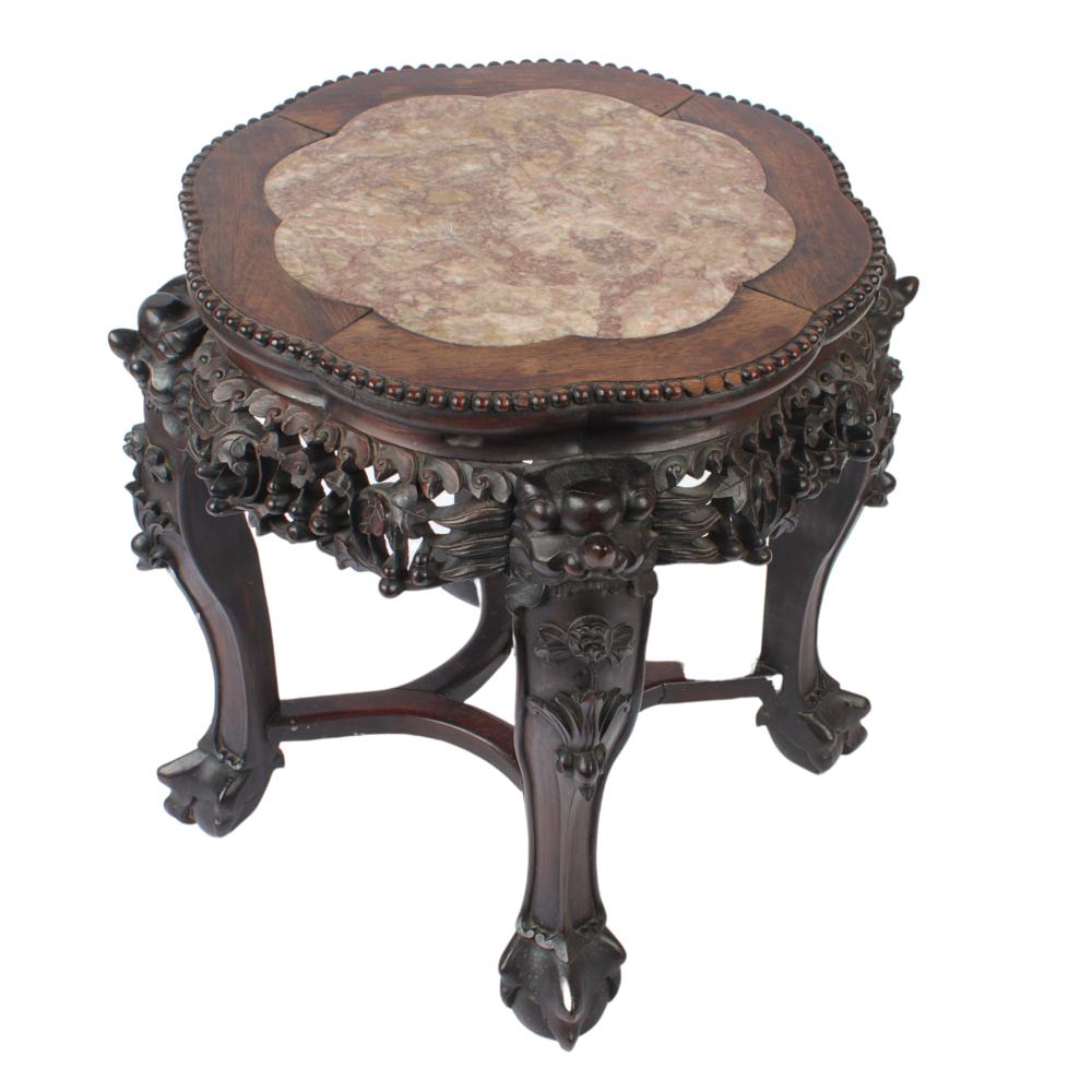 Appraisal: CHINESE ORNATELY CARVED BEAST AND FLORAL MARBLE TOP HARDWOOD SIDE