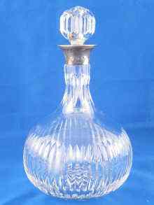 Appraisal: A silver mounted cut glass decanter by Asprey London