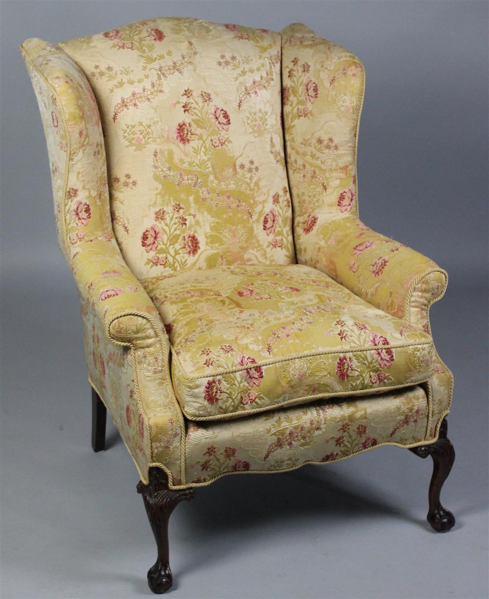 Appraisal: CHIPPENDALE STYLE WING CHAIR WITH CARVED BALL AND CLAW FEET