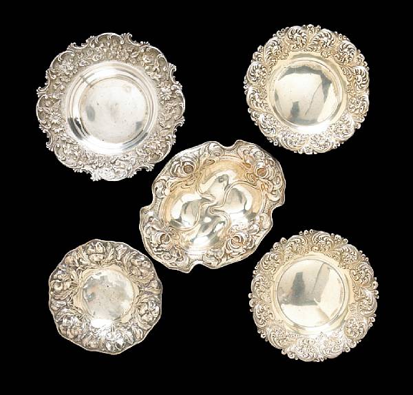 Appraisal: A group of sterling table articles Comprising floral chased butter