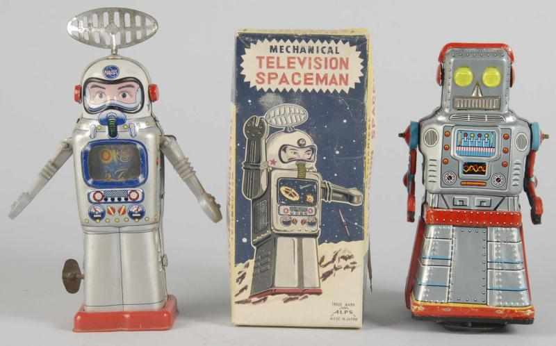 Appraisal: Lot of Tin Robot Astronaut Toys Description Japanese Working Includes