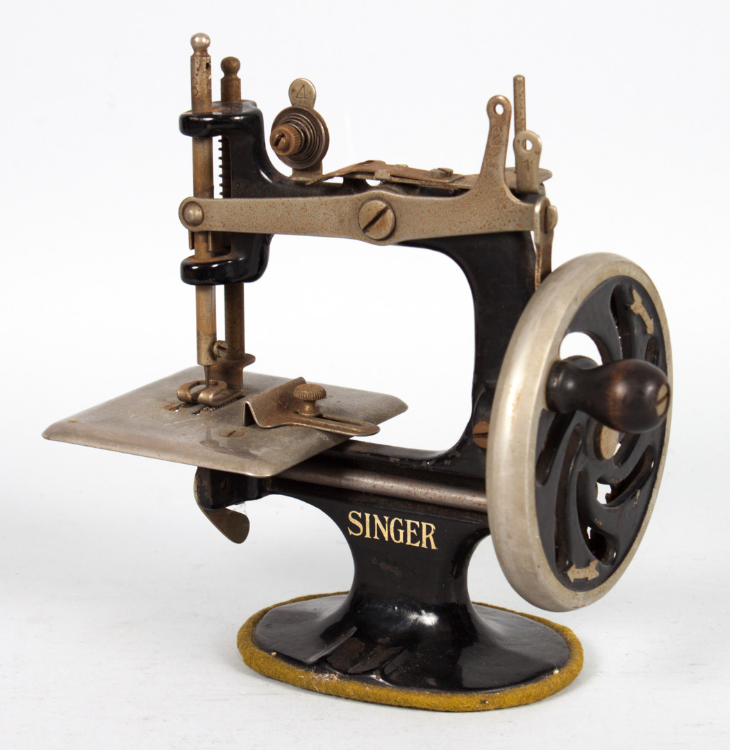 Appraisal: Miniature Singer sewing machine late th century in H