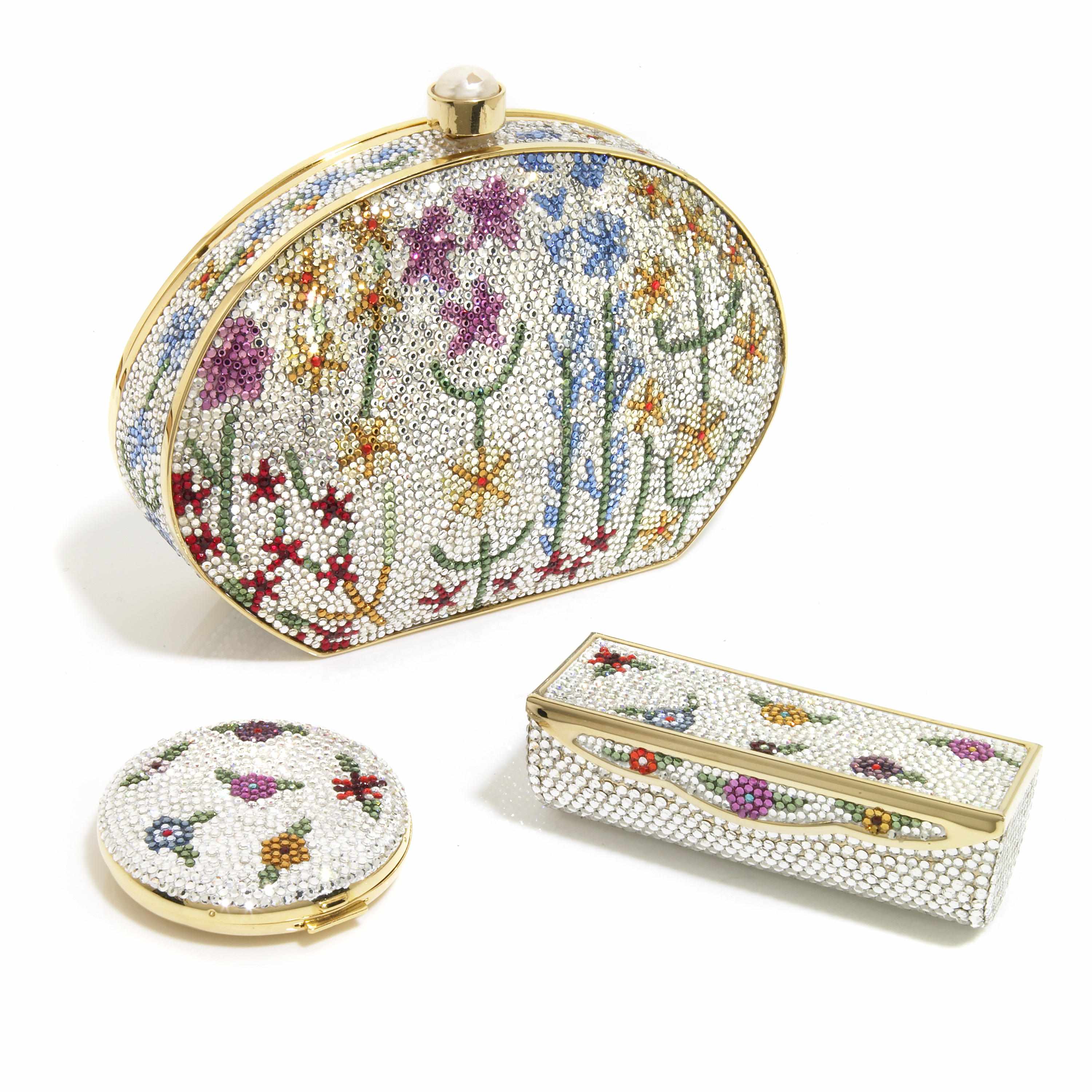 Appraisal: A silver crystal purse with multi-colored floral motifs together with