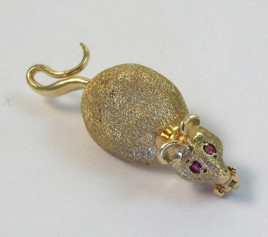 Appraisal: RUBY AND FOURTEEN KARAT GOLD BROOCH The mouse brooch is