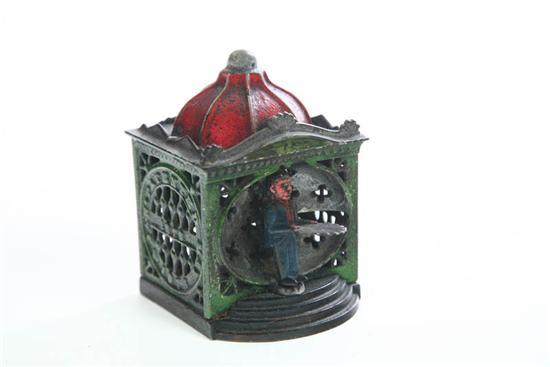 Appraisal: CAST IRON BANK The mechanical bank has a teller on