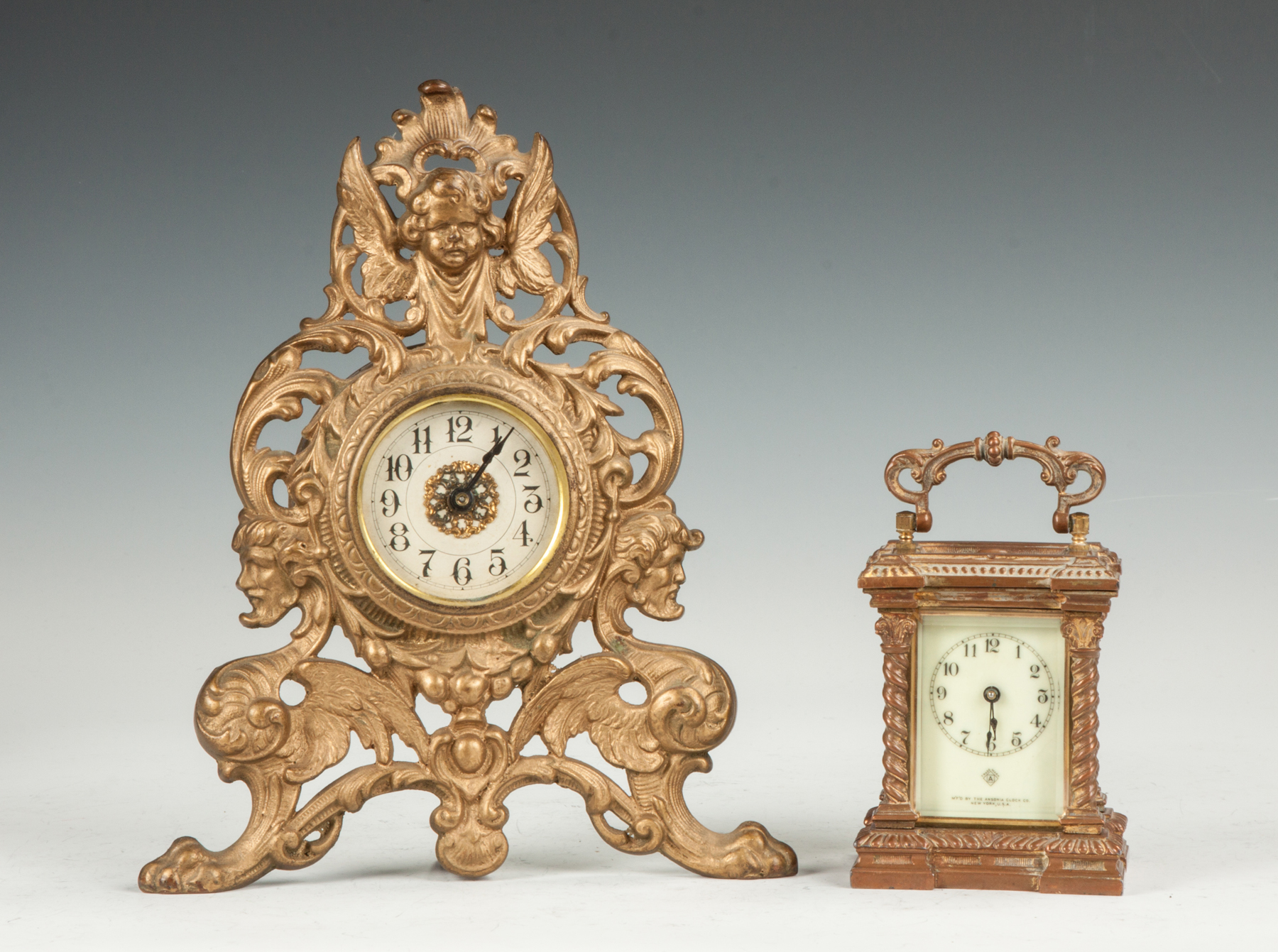 Appraisal: Ansonia Fancy Cast Brass Carriage Clock Beveled glass porcelain dial