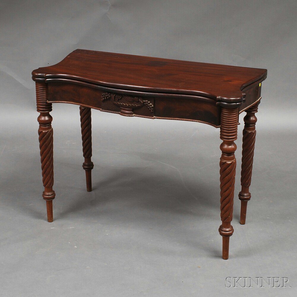 Appraisal: Federal-style Carved Mahogany Card Table the top with half-serpentine ends