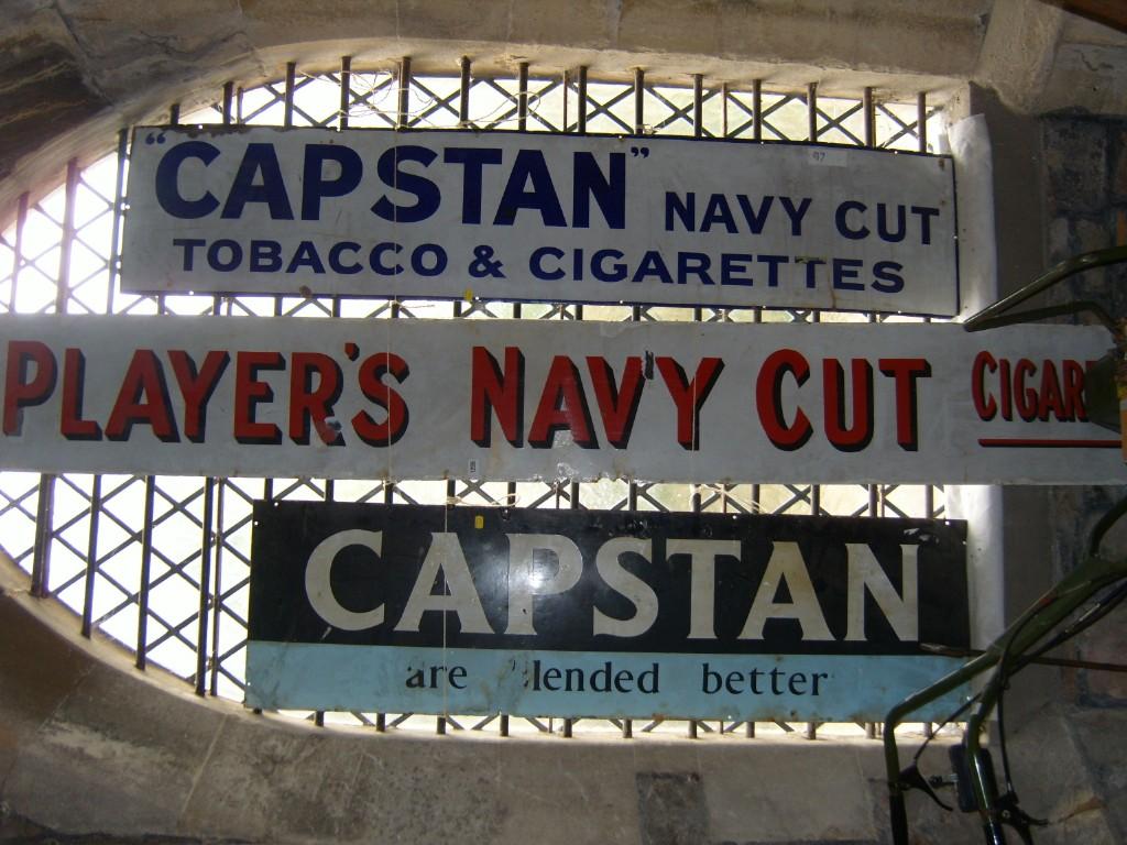 Appraisal: Three enamel signs of rectangular form two advertising Capstan Cigarettes