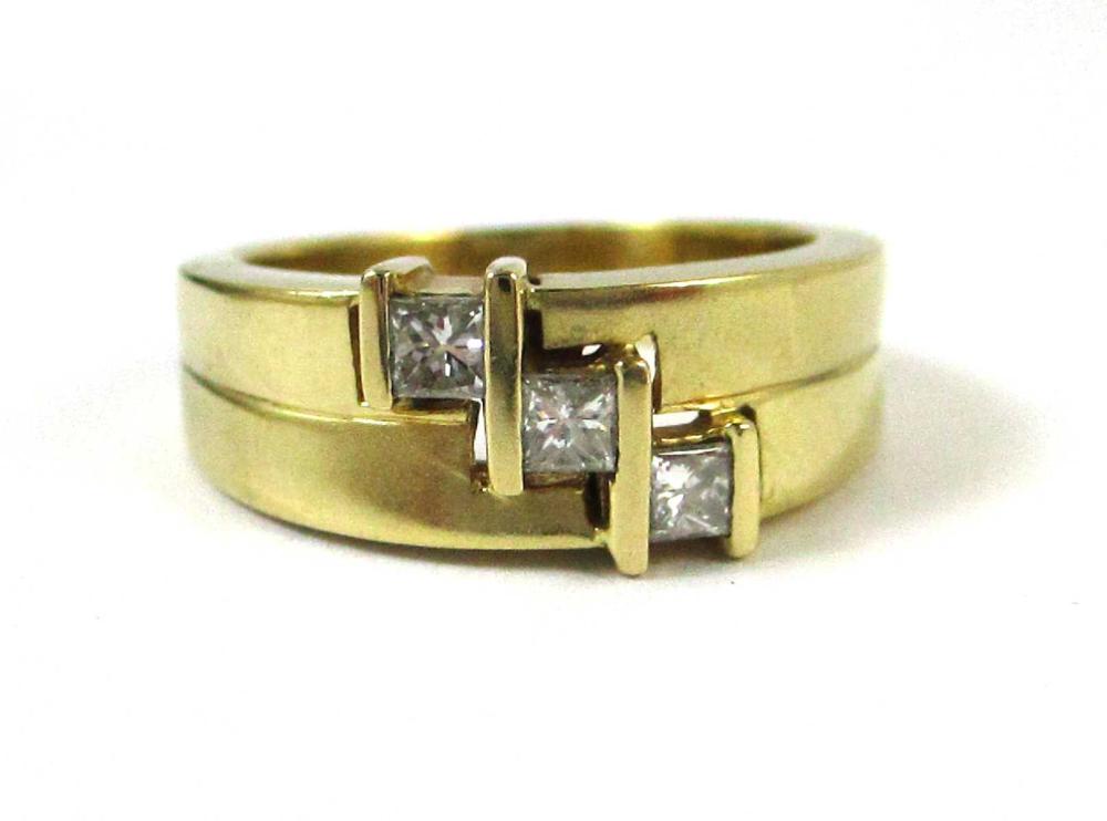 Appraisal: DIAMOND AND EIGHTEEN KARAT GOLD THREE-STONE RING The past-present-future k