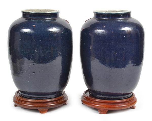 Appraisal: A PAIR OF CHINESE BLUE GLAZED EARTHENWARE JARS each with