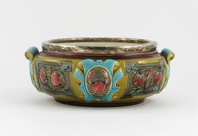 Appraisal: A Wedgwood Majolica bowl moulded with panels of crabs shields