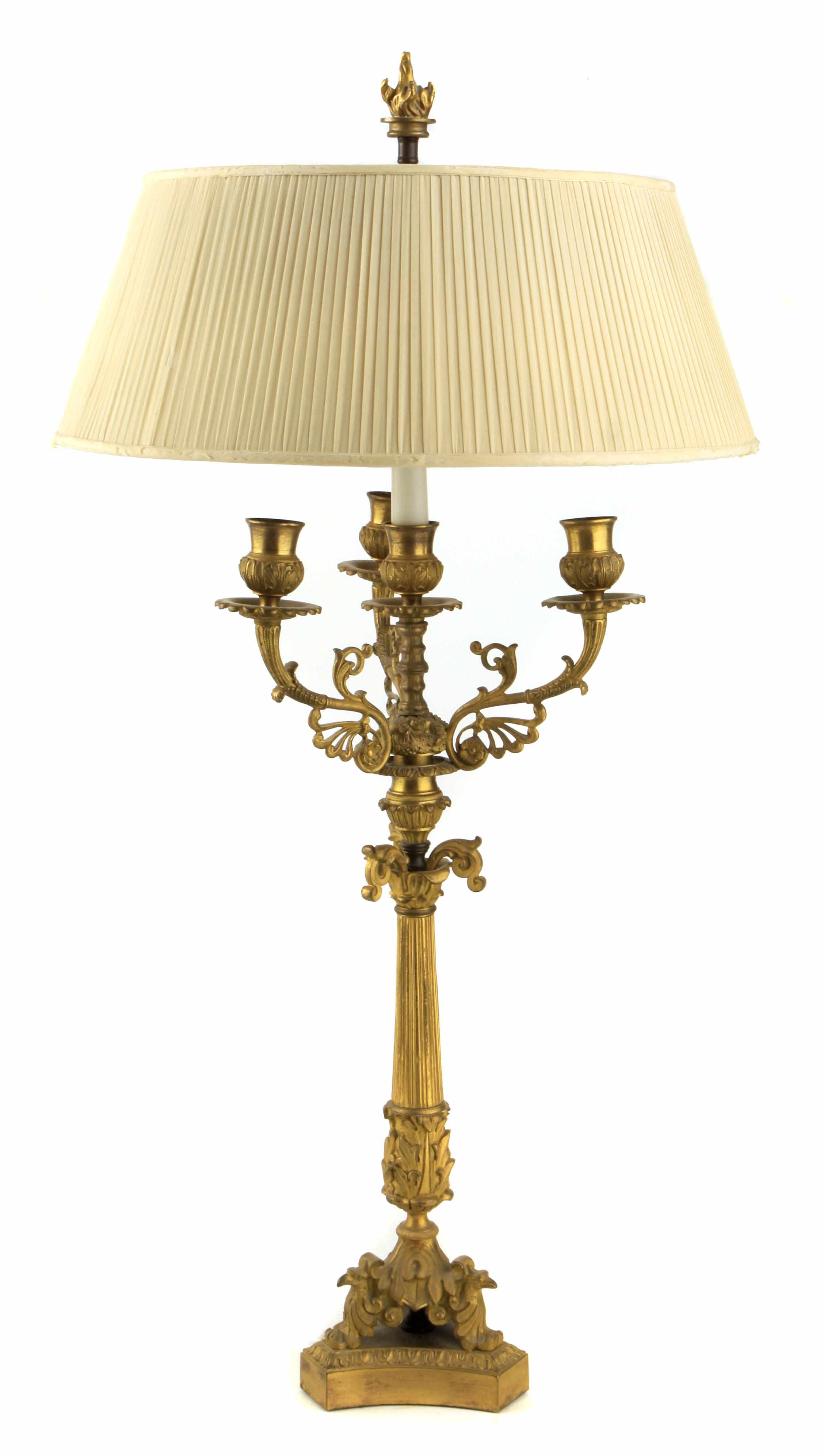 Appraisal: A Napoleon III gilt bronze four light candelabrum now as