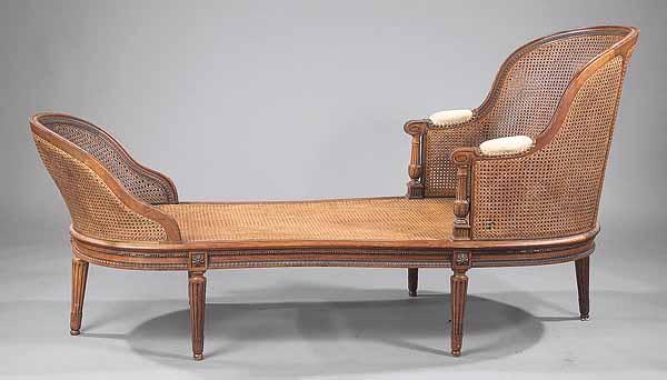 Appraisal: An Antique Louis XVI-Style Carved Walnut Chaise Longue having a