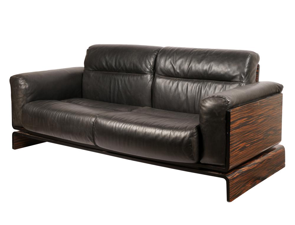 Appraisal: ITALIAN ROSEWOOD VENEER BLACK LEATHER PLATFORM SOFA inches wide inches