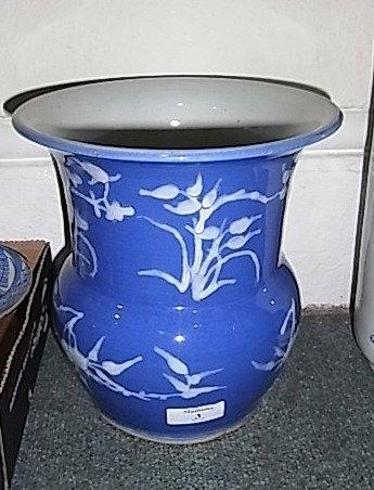 Appraisal: A CHINESE BLUE GROUND SMALL BALUSTER VASE with blossom designs