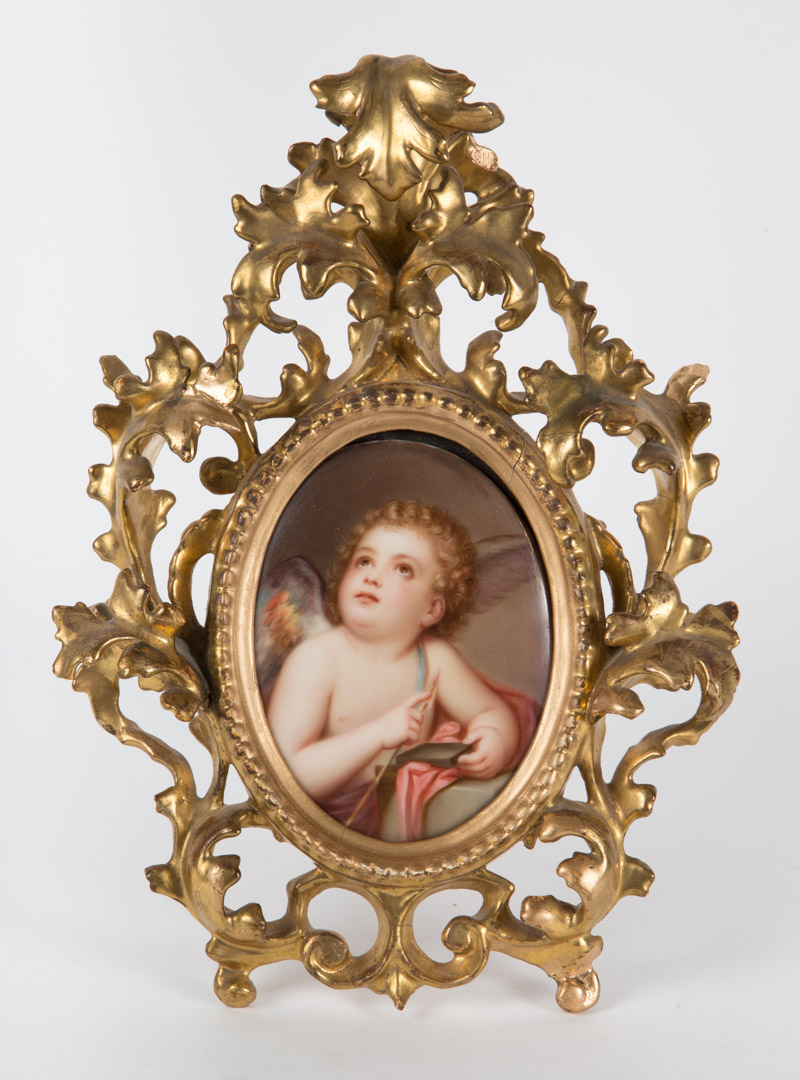 Appraisal: German painted porcelain plaque of cupid late th early th